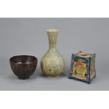 THREE CHINESE / JAPANESE CERAMIC ITEMS. To include a Chinese Yaozhou style celadon glazed pear