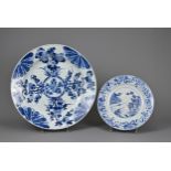 TWO CHINESE BLUE AND WHITE DISHES, 18TH CENTURY. To include a large Kangxi (1662-1722) deep dish