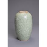 A CHINESE PALE CELADON PORCELAIN JAR, 19TH CENTURY. Of ovoid form with moulded decoration of two