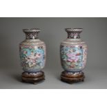A LARGE PAIR OF CHINESE CLOISONNE ENAMEL VASES, 20TH CENTURY. Of baluster form decorated with