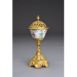 A CHINESE FAMILLE ROSE WINE CUP ON GILT STAND WITH COVER, 18TH CENTURY. A Yongzheng period (1722-35)