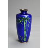 A JAPANESE LATE MEIJI PERIOD (1868-1912) SMALL BLUE-GROUND CLOISONNE TAPERING OVIFORM VASE.