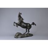 A JAPANESE BRONZE MODEL OF A REARING HORSE, EARLY-MID 20TH CENTURY. With four character seal mark