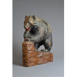 A LARGE 20TH CENTURY JAPANESE CARVED WOOD MODEL OF A HOKKAIDO BEAR. Naturalistically chip-carved and