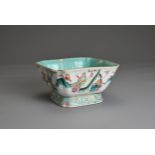 A CHINESE FAMILLE ROSE PORCELAIN BOWL, TONGZHI, 19TH CENTURY. Square lobed form decorated with the