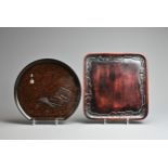 TWO 20TH CENTURY JAPANESE KAMAKURA-BORI WOODEN TRAYS. The first of square form, carved with a