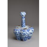 A CHINESE BLUE AND WHITE PORCELAIN TULIP VASE, MID 19TH CENTURY. With five compartments around the