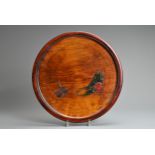 A VINTAGE JAPANESE LARGE CIRCULAR WOOD TRAY. Carved with vegetables and gourds, stained in red and