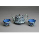 A CHINESE CLOISONNE ENAMEL TEAPOT WITH CUPS, EARLY 20TH CENTURY. On a pale blue enamel ground with