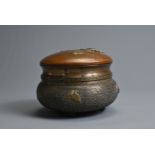 A 20TH CENTURY JAPANESE BRONZE CIRCULAR FOOTED BOWL AND COVER. The top applied and engraved with