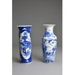 TWO CHINESE BLUE AND WHITE PORCELAIN VASES, 19TH CENTURY. The first decorated with lady and children