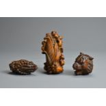 THREE 20TH CENTURY JAPANESE BOXWOOD CARVINGS. Comprising: mice climbing a cob of corn, a treen model