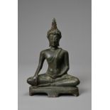 A THAI BRONZE FIGURE OF BUDDHA, 20TH CENTURY. Dressed in robes in Bhumiparsha mudra pose. 19cm tall.