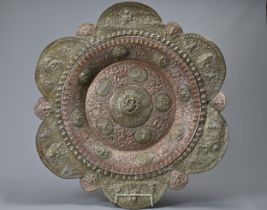 A LARGE INDIAN OR SOUTH EAST ASIAN BRASS AND COPPER CHARGER, EARLY 20TH CENTURY. Of radiating