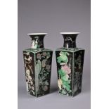 A LARGE PAIR OF CHINESE FAMILLE NOIRE TAPERED SQUARE FORM VASES, EARLY 20TH CENTURY. Decorated in