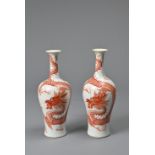 A PAIR OF CHINESE IRON RED DECORATED BALUSTER VASES, 19/20TH CENTURY. Finely potted, decorated