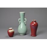 THREE CHINESE PORCELAIN VASES, PROBABLY 20TH CENTURY. To include a celadon glazed pear shaped bottle