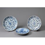 THREE CHINESE BLUE AND WHITE PORCELAIN DISHES, 19/20TH CENTURY. To include a pair of dishes with