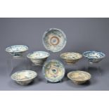 A GROUP OF CHINESE BLUE AND WHITE PORCELAIN BOWLS, QING DYNASTY. Of varying sizes decorated with