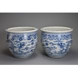 A GOOD LARGE PAIR OF CHINESE BLUE AND WHITE PORCELAIN JARDINIÈRES, 19TH CENTURY. Heavily potted,