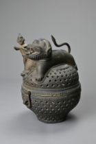 AN CAST BRONZE INCENSE BURNER, EARLY 20TH CENTURY. Possibly Indian, of globular form with hinged lid