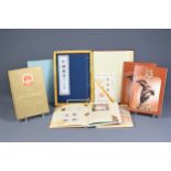 FOUR CHINESE COMMEMORATIVE STAMP BOOKS, 20TH CENTURY. To include Guangzhou city commemorative