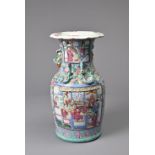 A CHINESE FAMILLE ROSE PORCELAIN VASE, 19TH CENTURY. of baluster form decorated with figures, four