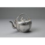 A CHINESE SILVER TEAPOT, 19/20TH CENTURY. Decorated with floral scrolls and panels of ladies, with