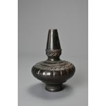 A SOUTH EAST ASIAN CARVED CERAMIC BOTTLE VASE, 20TH CENTURY, PROBABLY THAI