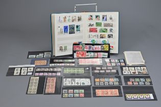 A QUANTITY OF CHINESE STAMPS, 20TH CENTURY. To include a stamp album and various loose sheets of