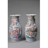 A LARGE PAIR OF CHINESE FAMILLE ROSE PORCELAIN VASES, 19TH CENTURY. Of baluster form decorated