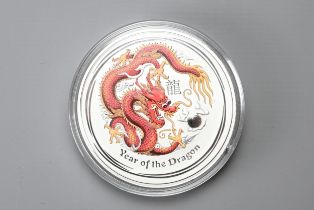 2012 AUSTRALIA 1KG 999 SILVER 'YEAR OF THE DRAGON' COIN FEATURING ELIZABETH II, CASED UNOPENED. No