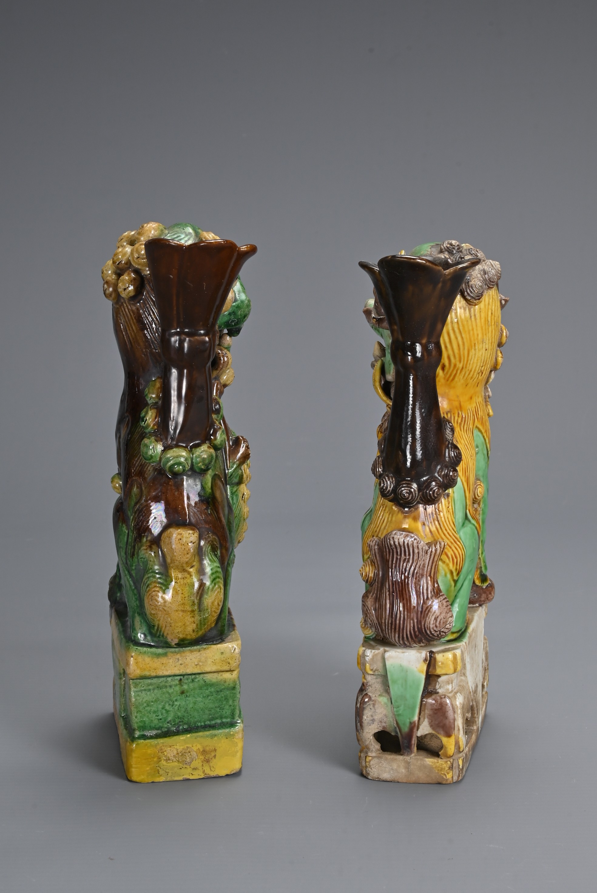 TWO CHINESE SANCAI GLAZED POTTERY JOSS STICK HOLDERS, QING DYNASTY. Buddhistic lions modelled seated - Image 4 of 6