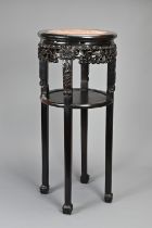 A CHINESE HARDWOOD MARBLE INSERT JARDINIERE STAND, 19/20TH CENTURY. Of cylindrical form on four legs