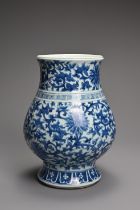 A CHINESE BLUE AND WHITE PORCELAIN HU TYPE JAR. Of wide baluster form decorated