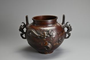 A JAPANESE MEIJI PERIOD (1868-1912) BRONZE TWO-HANDLED GLOBULAR VASE. Decorated in high relief