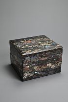 A JAPANESE Meiji period (1868-1912) BLACK LACQUER TWO TIER BOX. Of square section, inlaid with