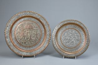 TWO MIDDLE EASTERN TINNED COPPER DISHES, 20TH CENTURY. The first decorated in low relief with deer