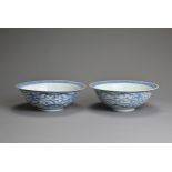 TWO CHINESE BLUE AND WHITE PORCELAIN BOWLS, 19TH CENTURY. Rounded bowls with everted rims