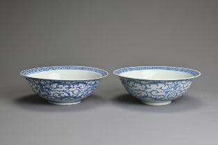 TWO CHINESE BLUE AND WHITE PORCELAIN BOWLS, 19TH CENTURY. Rounded bowls with everted rims