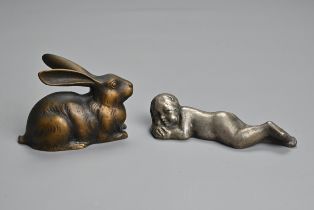 TWO 20TH CENTURY JAPANESE PAPERWEIGHTS. Comprising: a gilt bronze model of a recumbent rabbit,