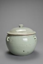 A CHINESE PALE CELADON GLAZED PORCELAIN TUREEN AND COVER, 19TH CENTURY. Rounded pot with four