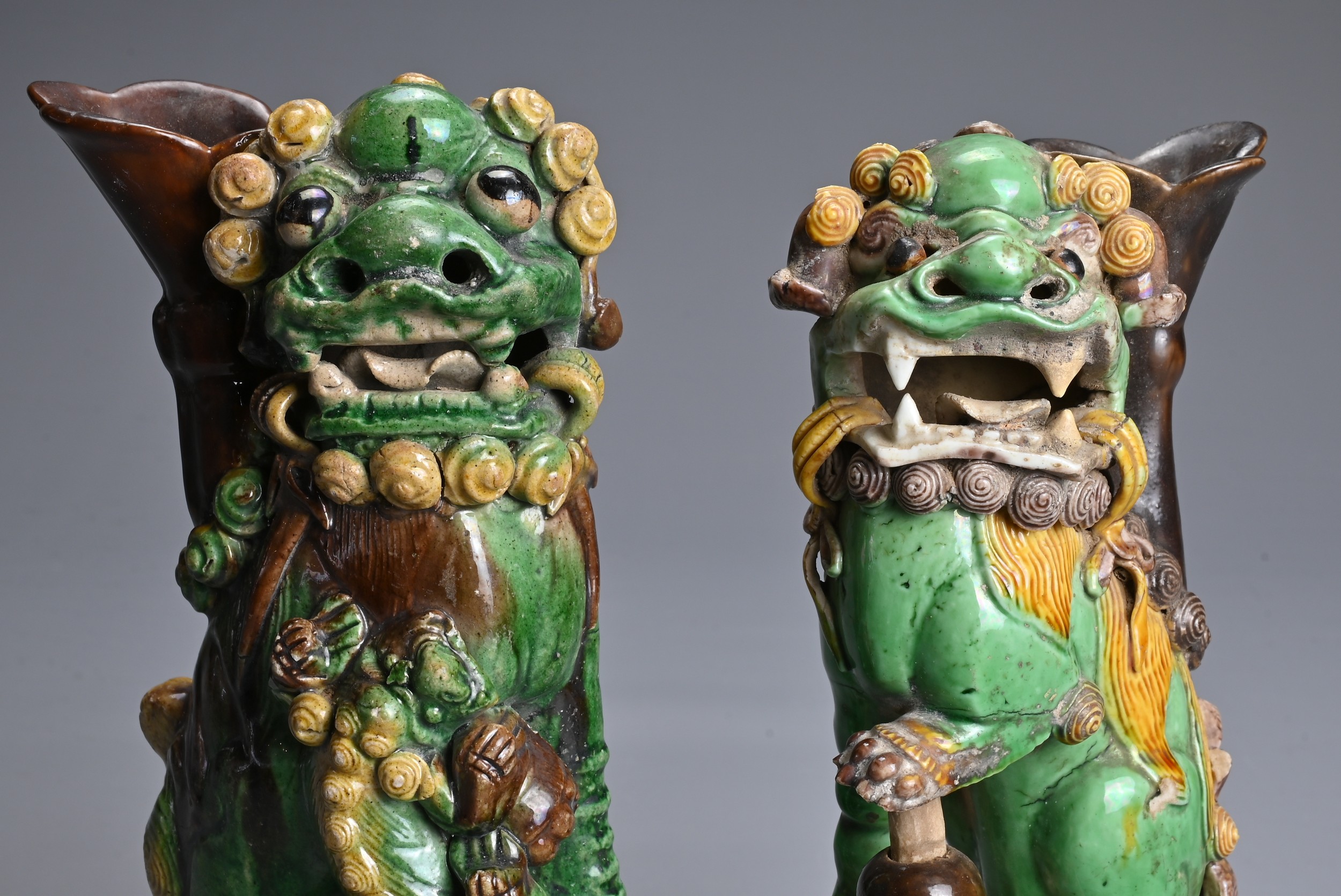 TWO CHINESE SANCAI GLAZED POTTERY JOSS STICK HOLDERS, QING DYNASTY. Buddhistic lions modelled seated - Image 6 of 6