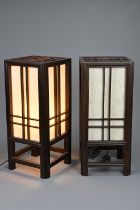 A PAIR OF EAST ASIAN WOOD AND PAPER LANTERN LAMPS. Wood framed of square form with paper lined sides