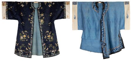 TWO CHINESE EMBROIDERED SILK ROBES, CIRCA 1900. The first dark-blue ground long robe embroidered