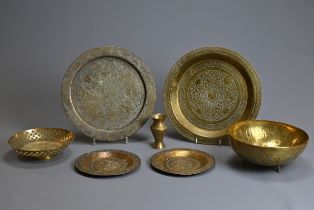 A GROUP OF BRASS ITEMS, 20TH CENTURY. To include three circular trays marked 'BIDA', probably