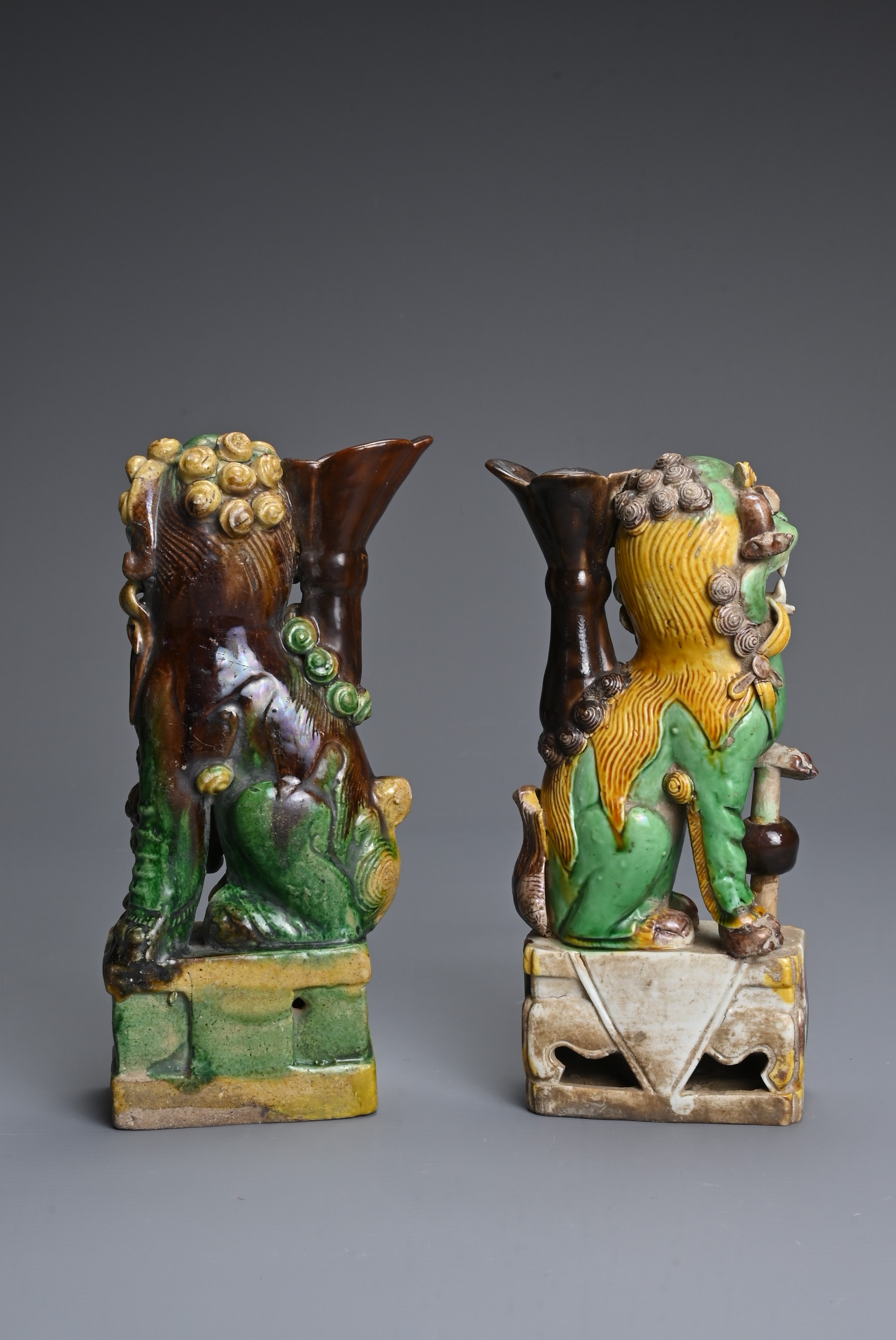 TWO CHINESE SANCAI GLAZED POTTERY JOSS STICK HOLDERS, QING DYNASTY. Buddhistic lions modelled seated - Image 3 of 6