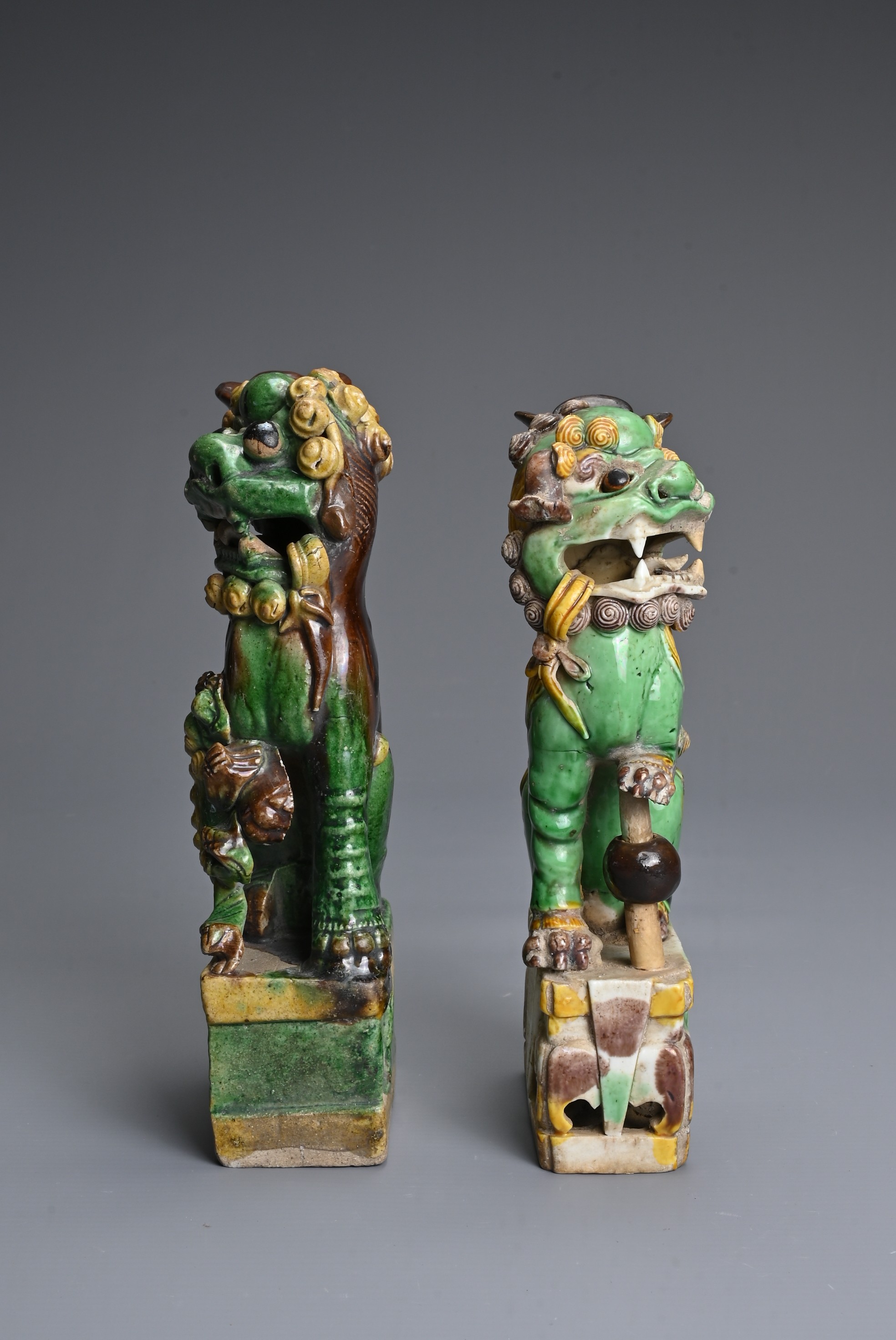 TWO CHINESE SANCAI GLAZED POTTERY JOSS STICK HOLDERS, QING DYNASTY. Buddhistic lions modelled seated - Image 2 of 6