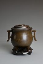 A CHINESE SILVER INLAID BRONZE TRIPOD CENSER, SHISOU MARK, QING DYNASTY. Depicting figures of