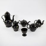 Four teapots, coffee pot and cup in black earthenware, Namur, presumably 18th century